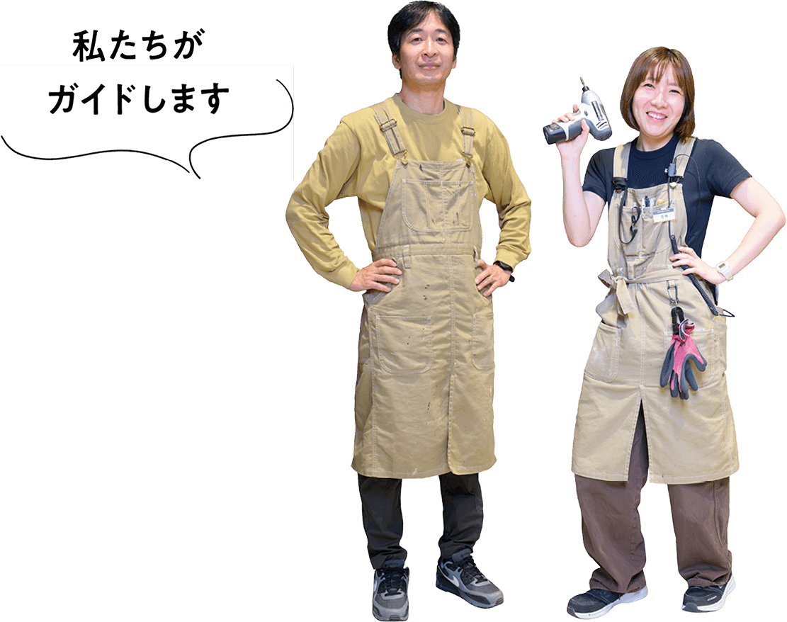 ポーズをとるマネージャーの杉山さんと主任の吉田さん