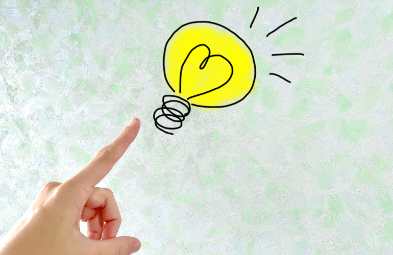 指先からひらめきの電球が出るイラスト