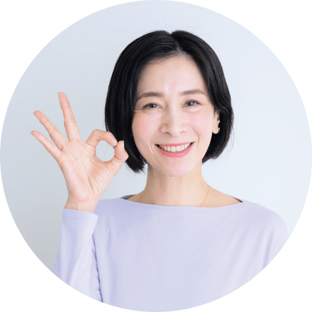 指でOKマークをする先生