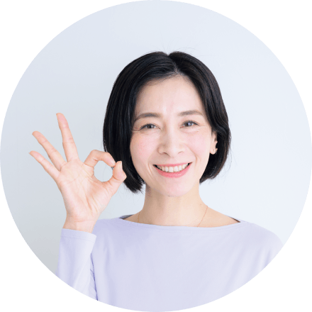 指でOKマークをする先生