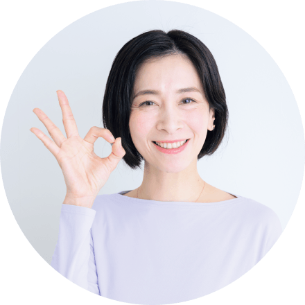 指でOKマークをする先生